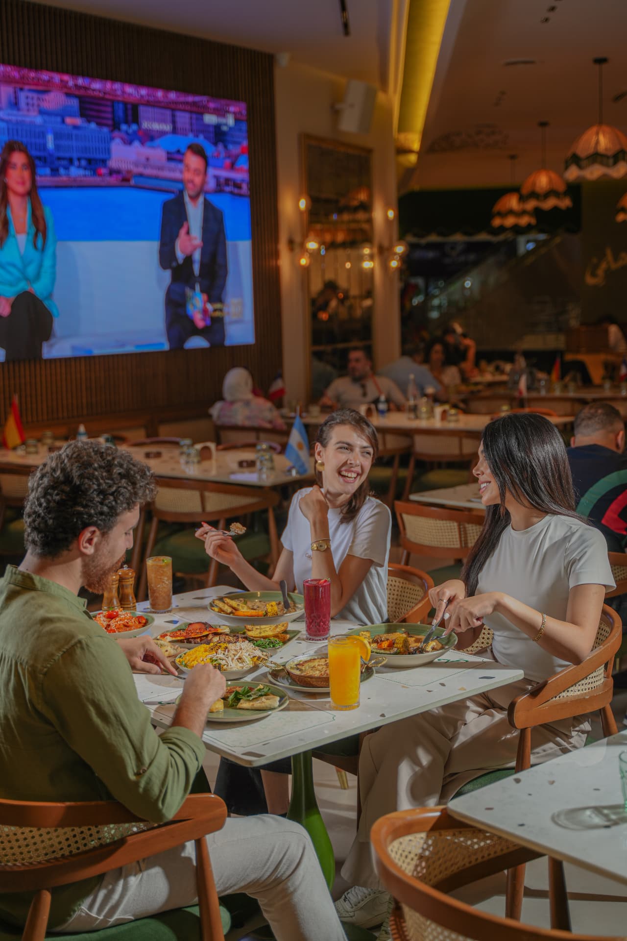 Guests dining at Helmi Cafe in Damascus